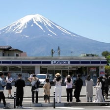 Mount Fuji rising above the surrounding Japanese landscape.