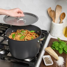 A cooking pot with its lid on top.