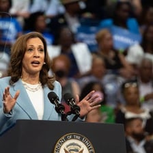 A political candidate speaking at a campaign rally.