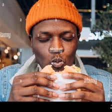 A person enjoying a bite of delicious food.