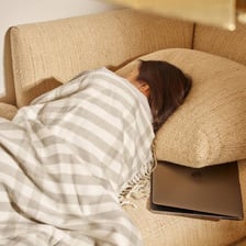 A person sleeping during a daytime nap