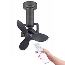 A ceiling fan mounted overhead in an indoor room