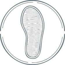A simple illustration of a shoe placed inside a circle