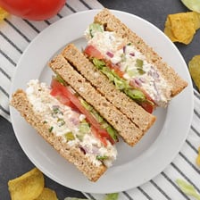 A deli sandwich prepared without mayonnaise.