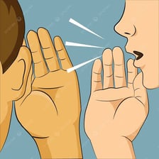 Two people sharing information privately