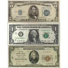 Several U.S. paper banknotes arranged together