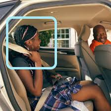 A passenger getting a lift from a driver
