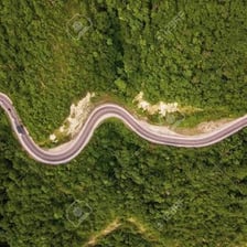 Road following a series of alternating turns.