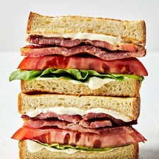 A BLT sandwich with visible mayonnaise on the bread.