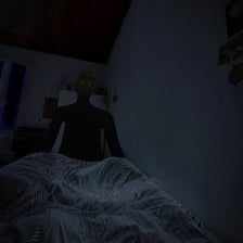 Person sleeping peacefully in bed