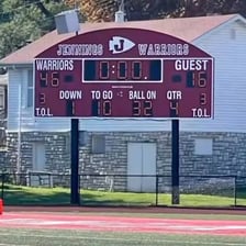 A sports scoreboard showing a decisive victory.