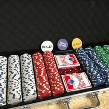 Poker chips placed in the pot before cards are dealt