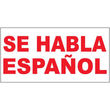 A sign displaying the Spanish phrase “Se habla español”