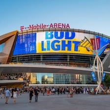 A sports stadium displaying a corporate sponsor’s name