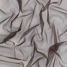 A close-up view of translucent tulle fabric.