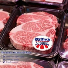 A steak package labeled USDA Choice beef.
