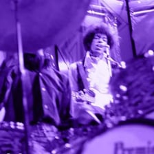 Jimi Hendrix performing with an electric guitar