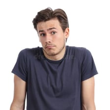 A person shrugging to show an indifferent or unimpressed reaction