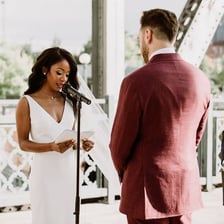 A couple exchanging wedding vows during a ceremony.