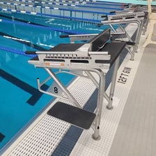 Swimmers competing at a swimming meet.