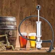 A beer keg fitted with a tap for dispensing beer.