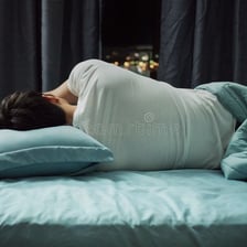 A person sleeping in bed