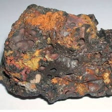 Dark metal slag left over from a smelting process
