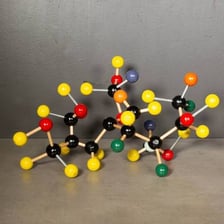 Ball-and-stick models representing atoms in a chemistry classroom.