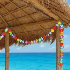 A colorful Hawaiian flower lei arranged as a garland.