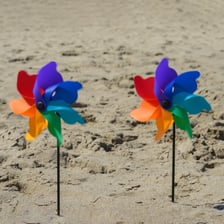 A colorful pinwheel toy with several paper blades