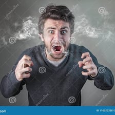 A visibly angry person showing frustration.