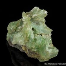 A pale talc mineral specimen showing its soft, layered texture.