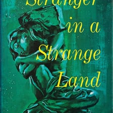 A book cover for Robert A. Heinlein’s “Stranger in a Strange Land.”