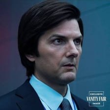 A portrait of actor Adam Scott associated with the television series Severance.