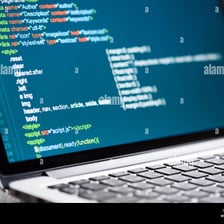 A computer screen displaying HTML markup code.