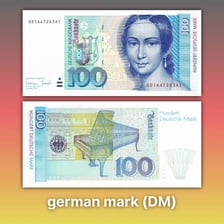 German mark notes shown alongside euro banknotes.