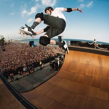 Tony Hawk performing a skateboarding maneuver
