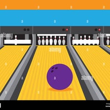 A bowling ball traveling down an alley toward the pins