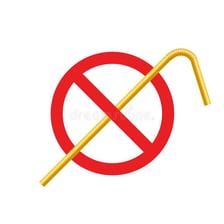 A sign or display advocating a ban on single-use plastic straws.
