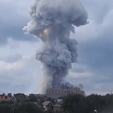 A large explosion producing a bright blast and smoke cloud.