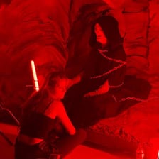 A horror-film scene featuring theatrical practical effects.