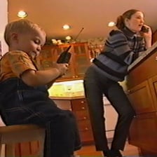 A child copying an adult's gesture