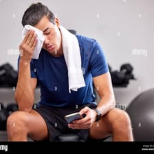 An exhausted person resting after physical effort