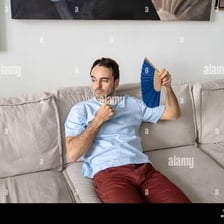 A person wiping sweat in intense summer heat