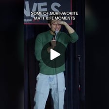 A comedian looking toward an unresponsive audience