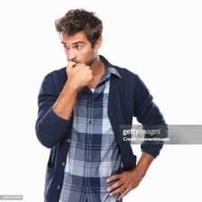 A bashful person looking away from the camera