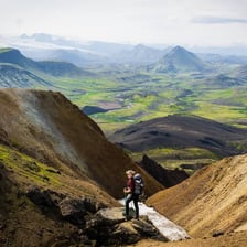 Hikers traveling along a long wilderness trail