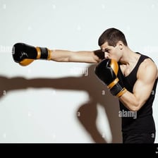 Boxer delivering a powerful punch