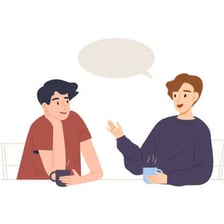 Two people engaged in a relaxed conversation