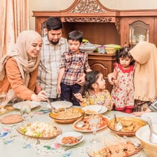 An Arab family celebrating Eid together.